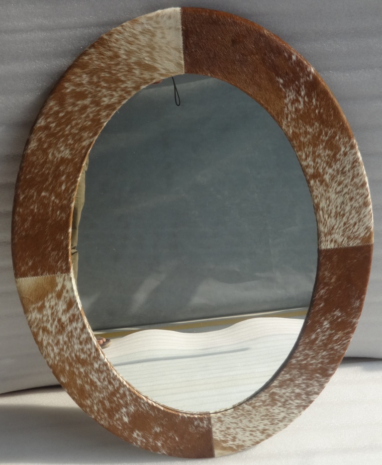 TAN WHITE HAIR ON OVAL MIRROR